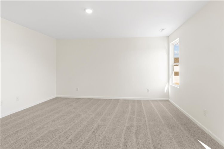 A room with a wood floor.