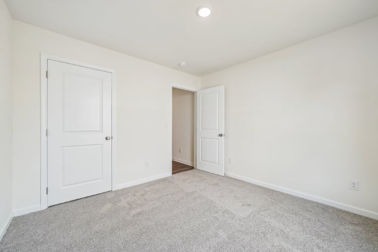 A room with white doors.