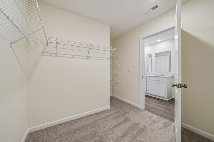 A hallway with white walls.