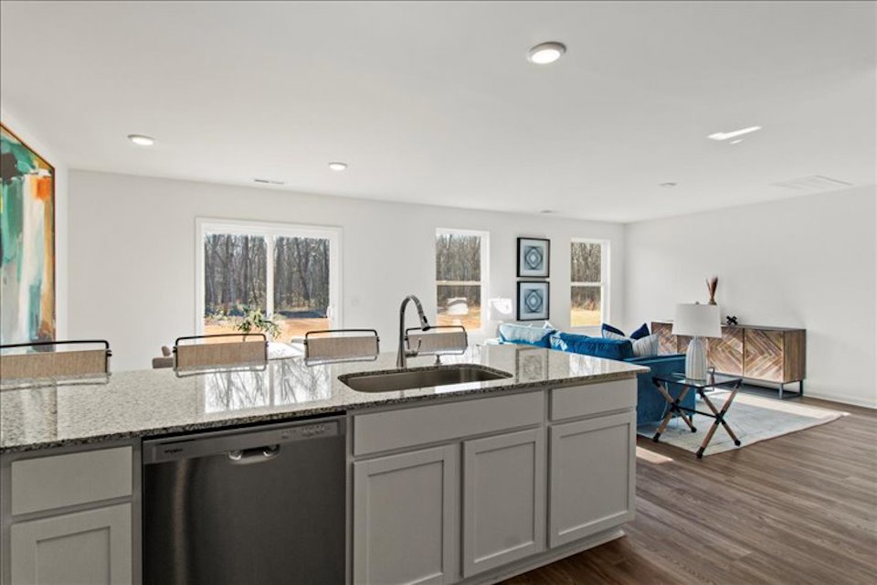 A kitchen with a large island.