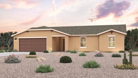 A house with a gravel driveway.