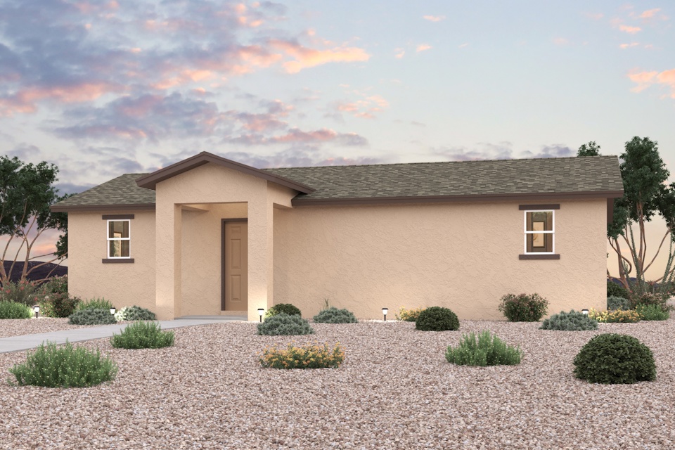 A house with a gravel driveway.