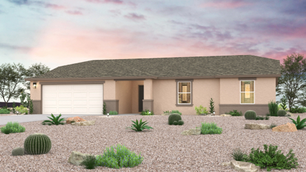 A house with a gravel driveway.