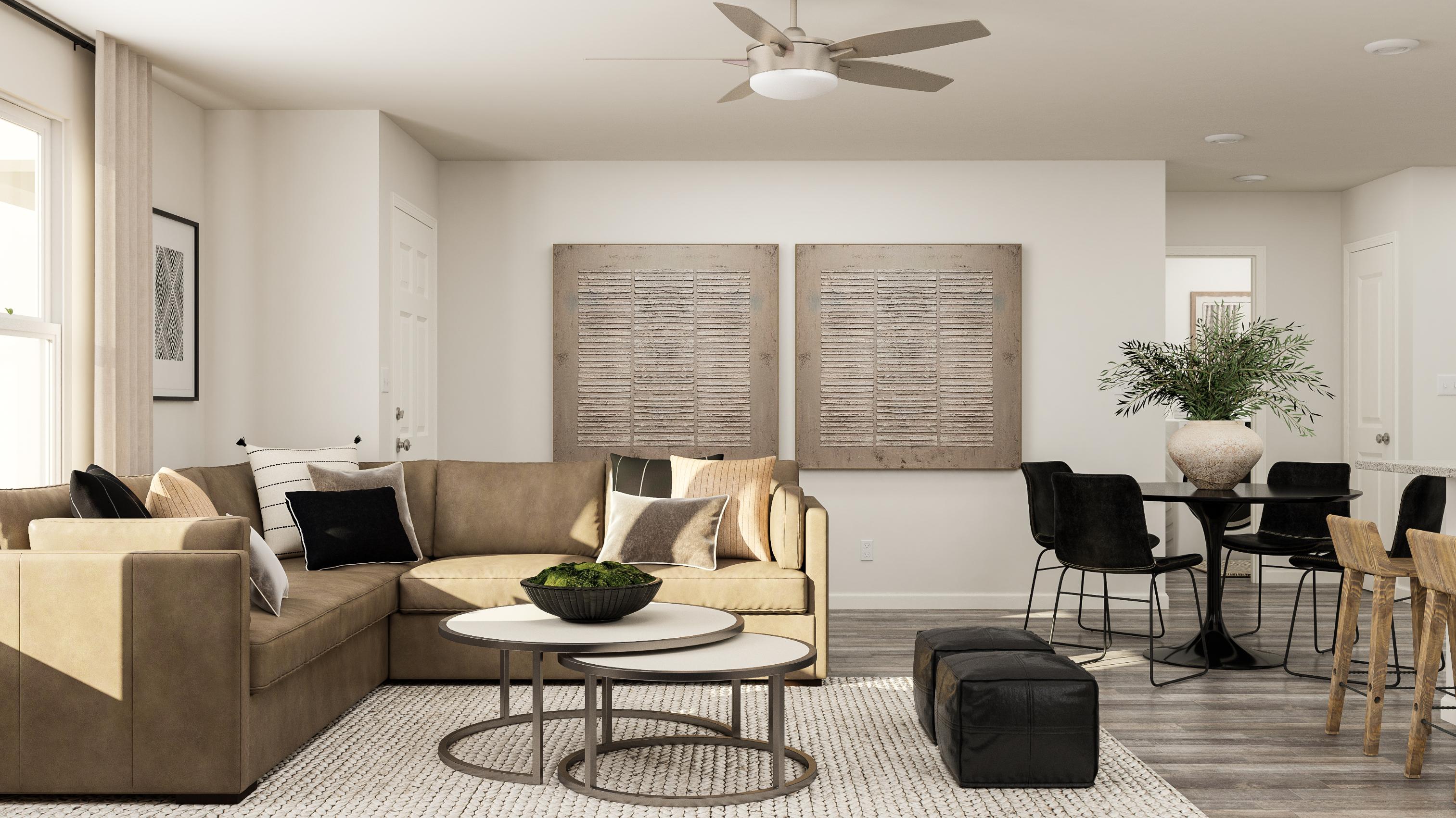 A living room with a couch and a table.