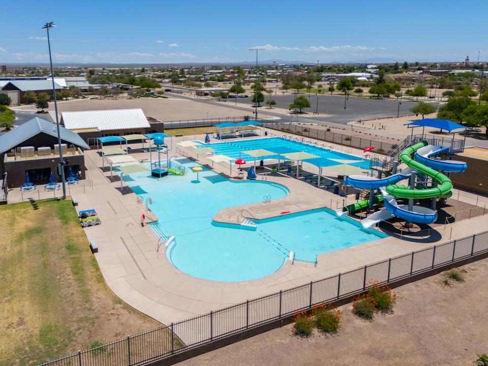 A swimming pool with a slide.