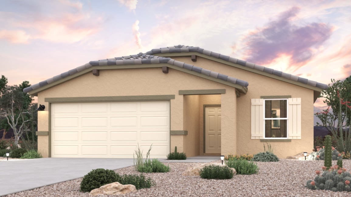 A house with a gravel driveway.