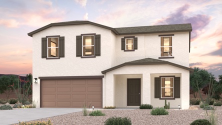 A white house with a garage.