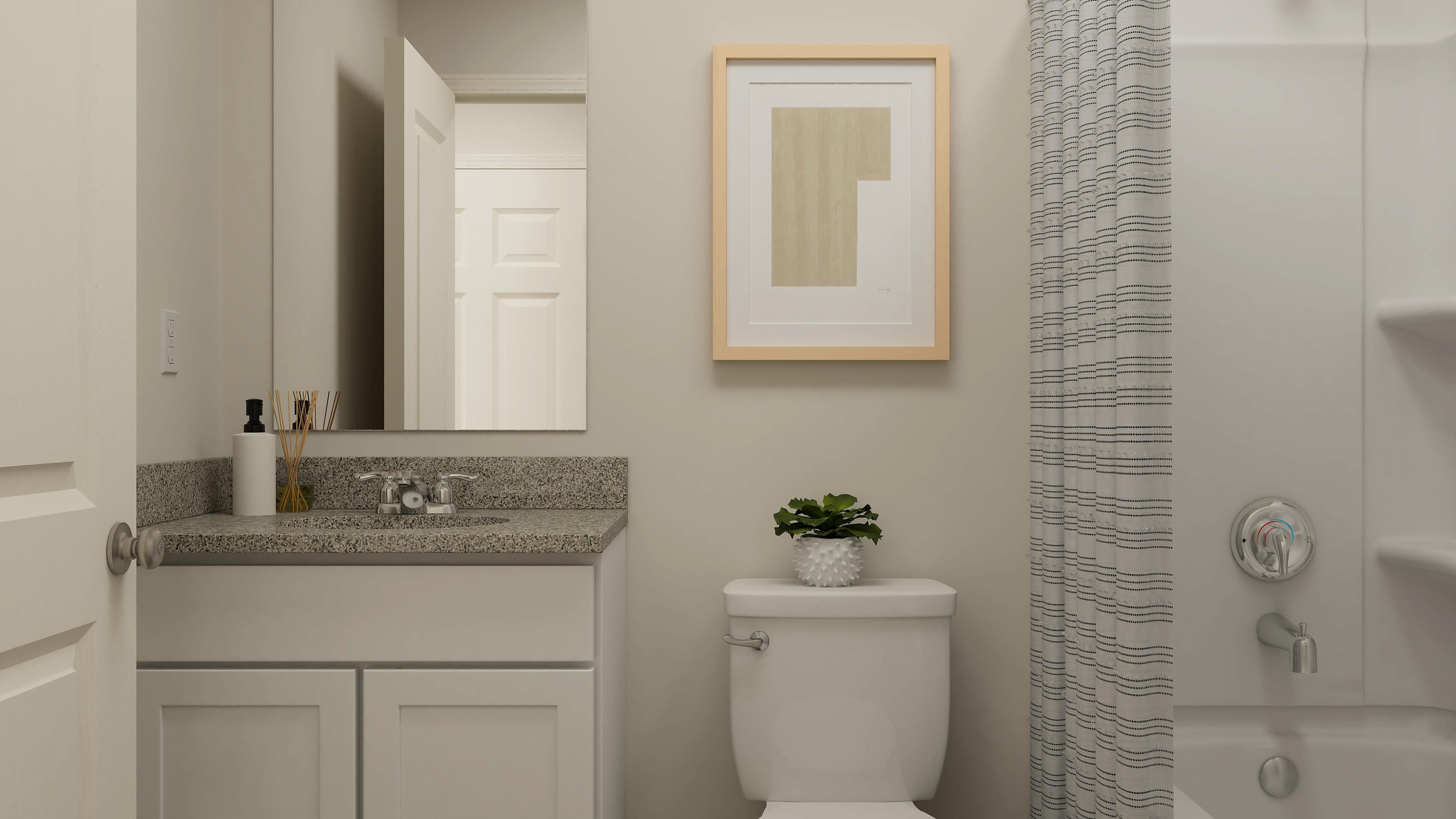 A bathroom with a sink and toilet.