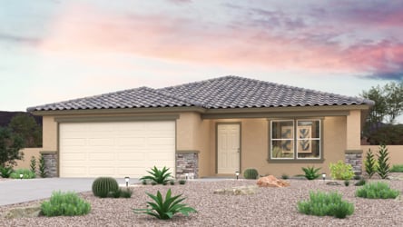 A house with a gravel driveway.