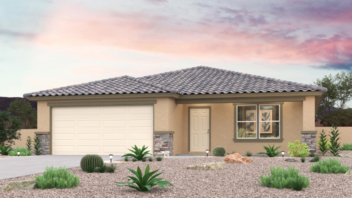 A house with a gravel driveway.
