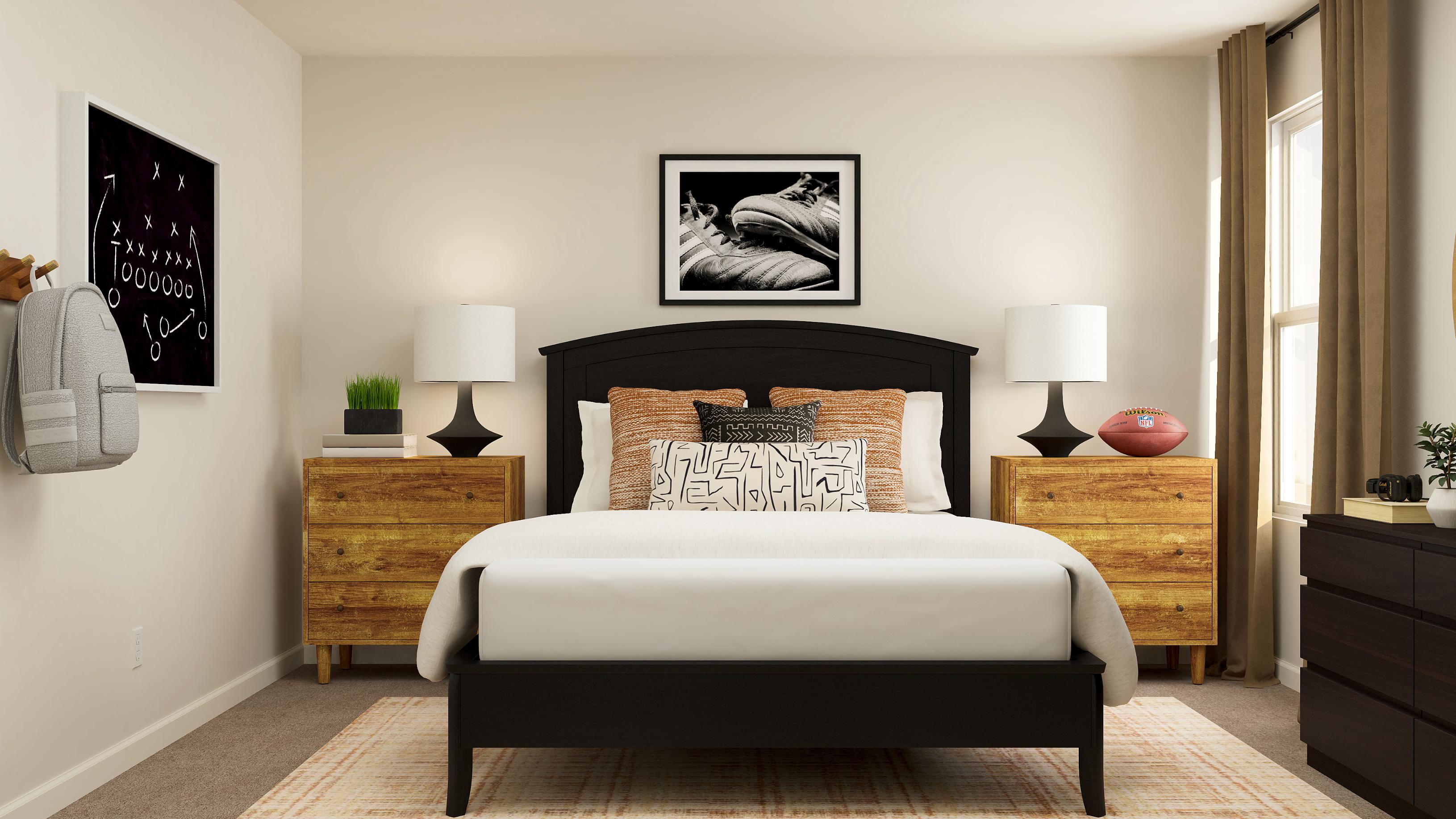 A bedroom with a bed and dresser.