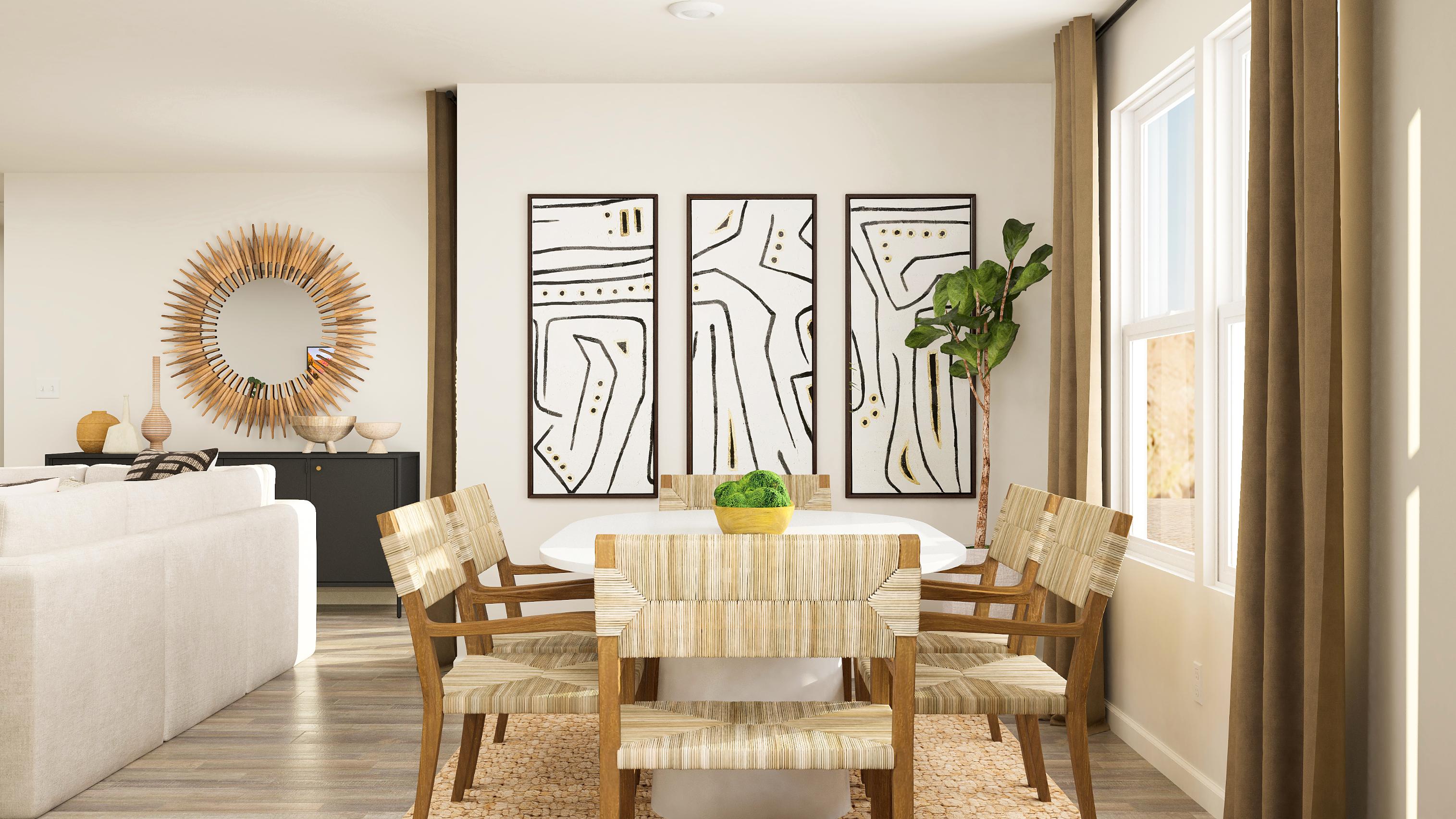 A dining room with a table and chairs.