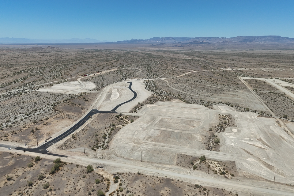 A large area of land with a road in it.