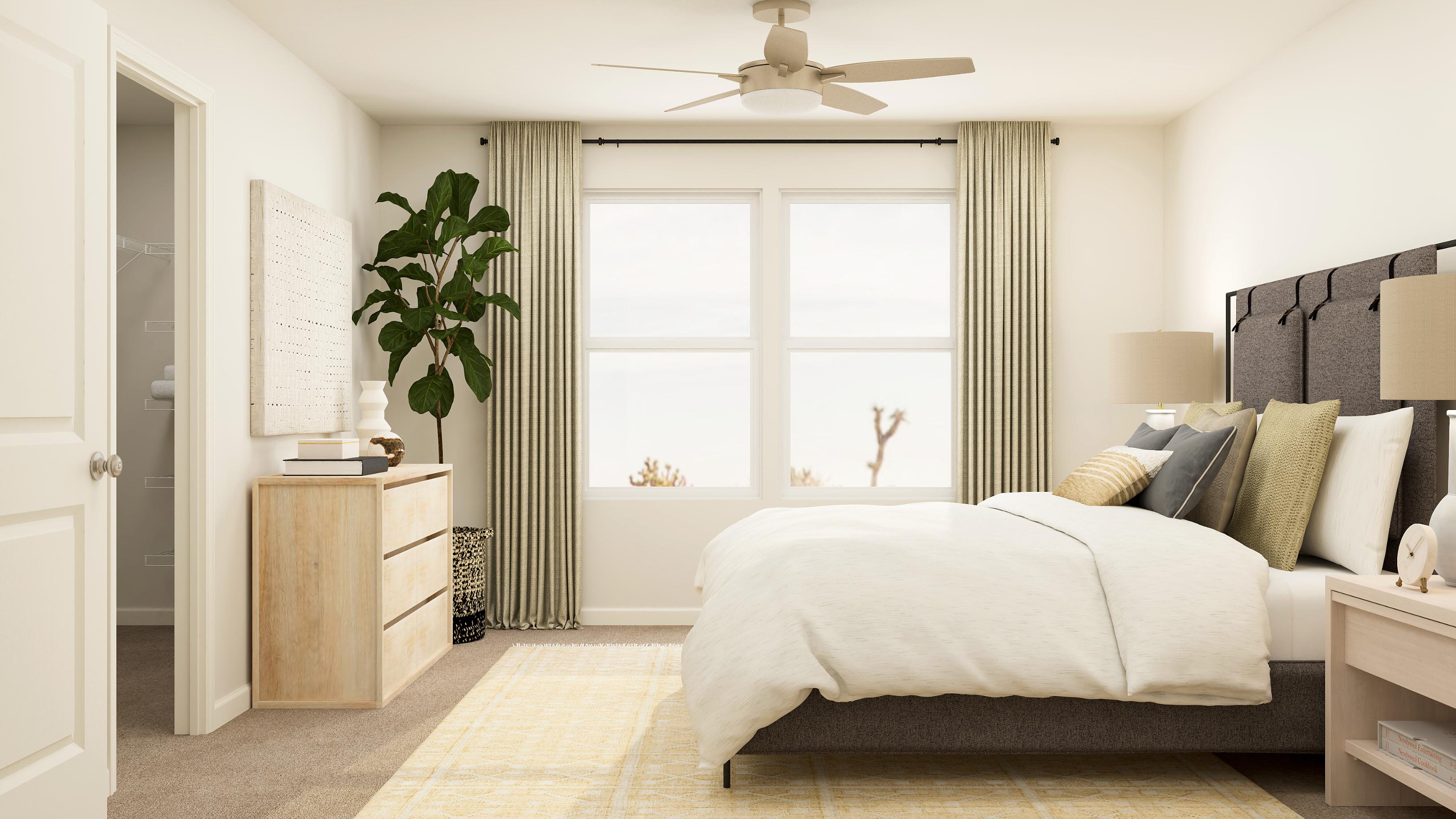 Spacious owner's suite with attached bathroom and walk-in closet.