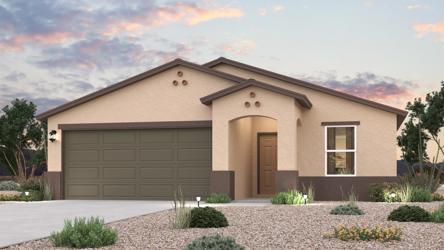 A house with a gravel driveway.