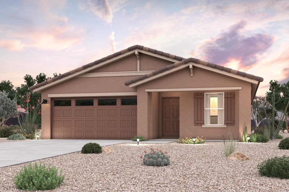 A house with a gravel driveway.