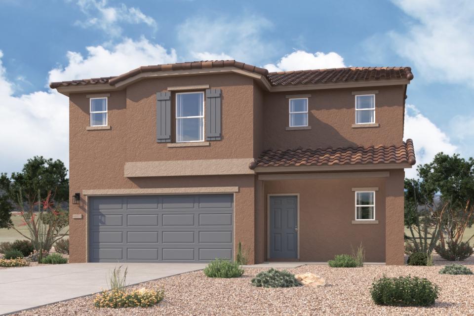 A house with garages and a driveway.