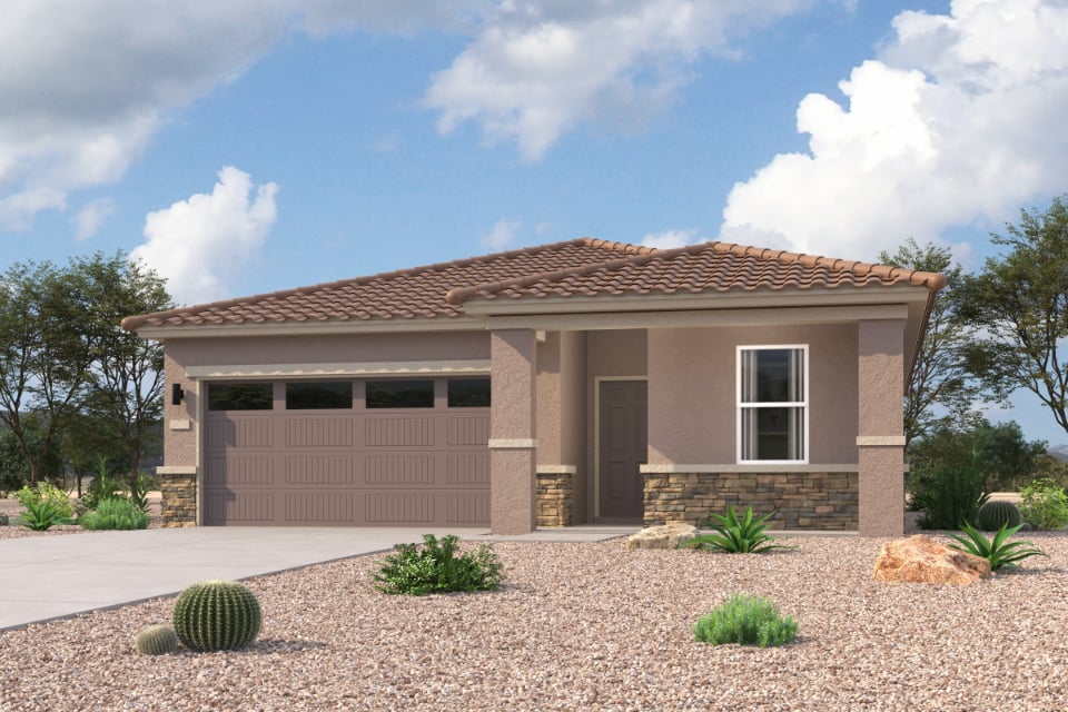 A house with a gravel driveway.