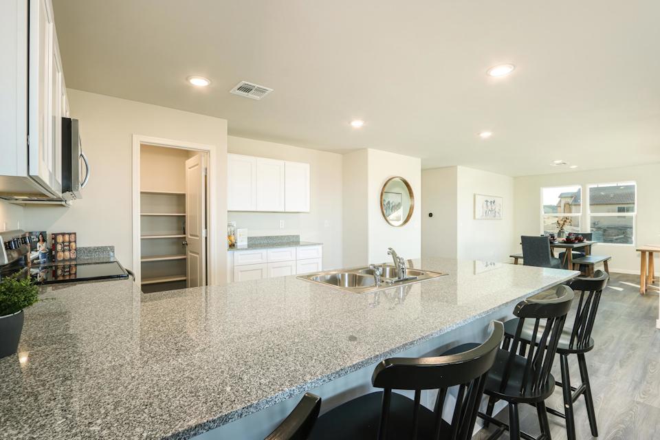 A kitchen with a large island.