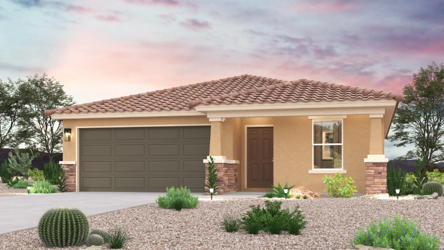 A house with a garage and bushes.