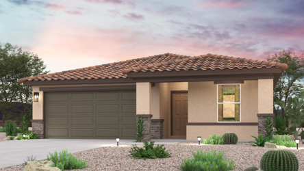 A house with a garage and bushes.