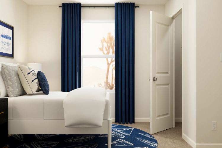 A room with a couch and a window.