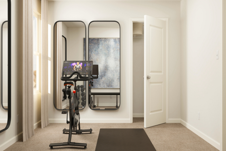 A room with a treadmill and a treadmill.