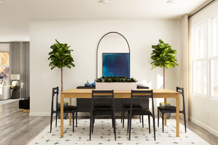 A dining room table with chairs and a large window.