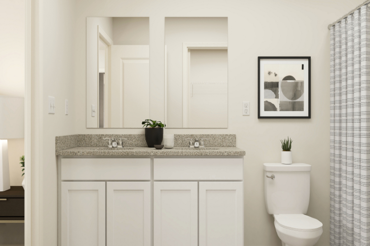 A bathroom with a sink and a toilet.
