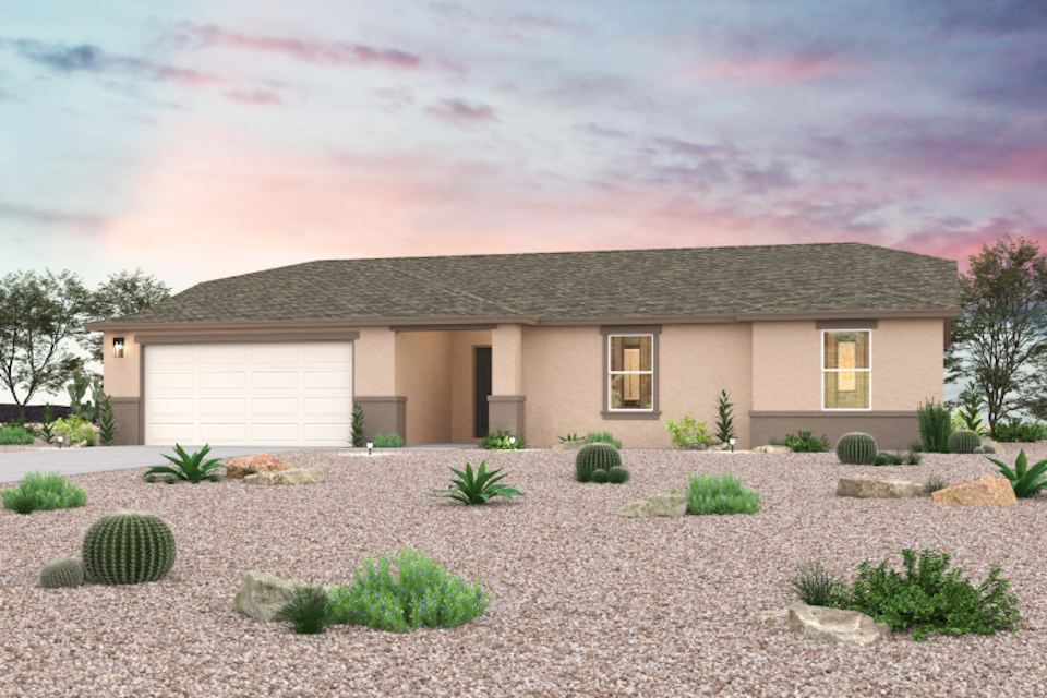 A house with a gravel driveway.