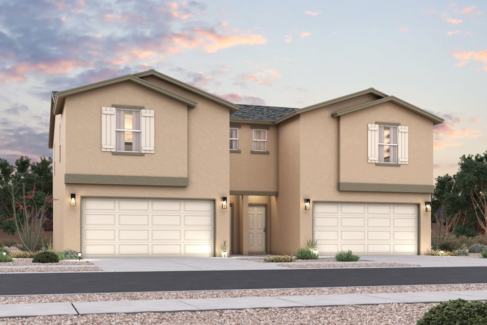 A house with garages and trees.