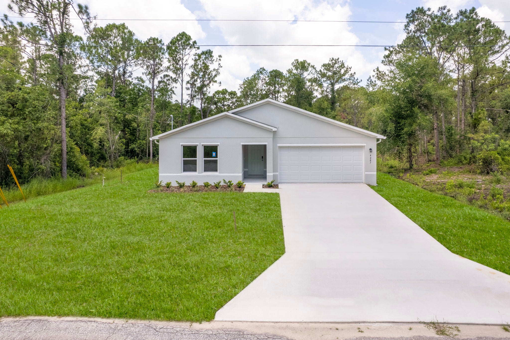 A house with a driveway.