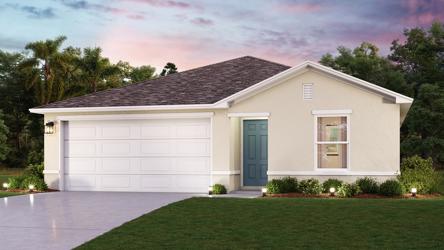 A white house with a green lawn.