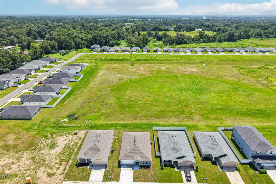A group of buildings in a field.