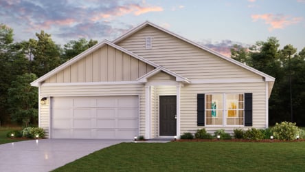 A house with a lawn with American Gothic House in the background.
