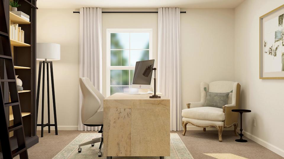 A room with a table and chairs.