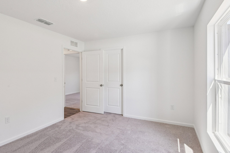 A room with white doors.