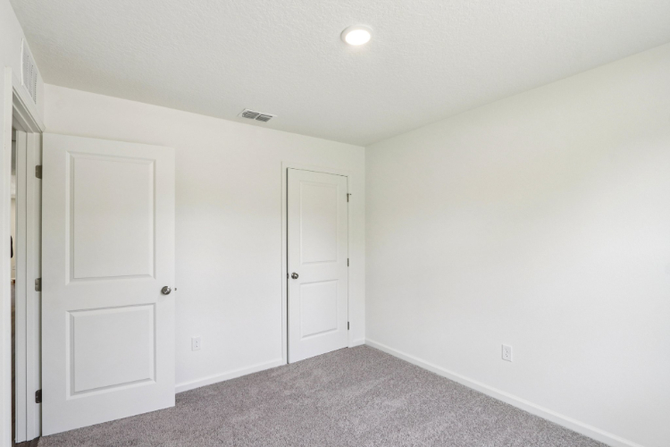 A room with white doors.