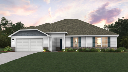 A house with a lawn in front of it.