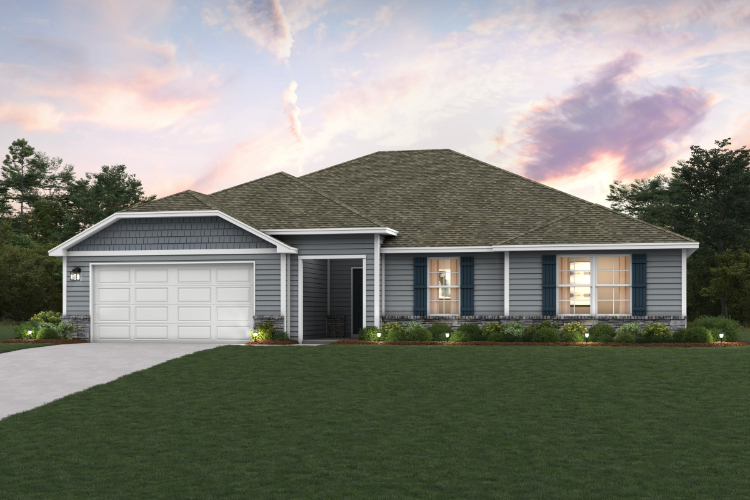 A house with a lawn in front of it.