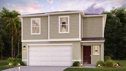 A white house with a garage.