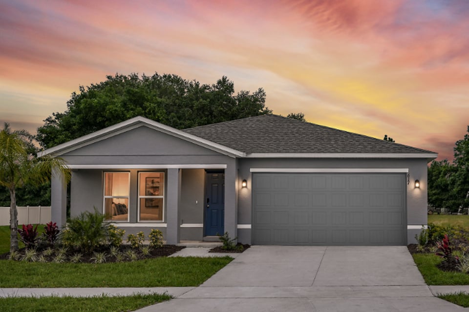 A house with a garage and a driveway.