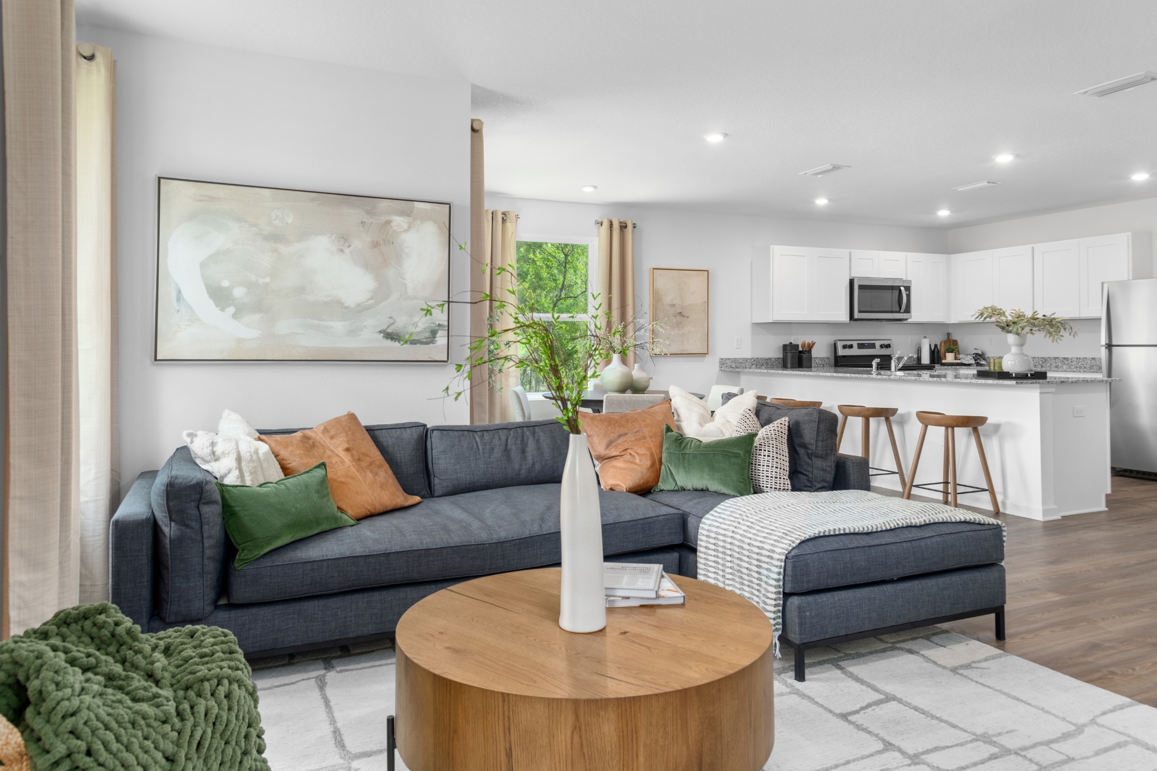 A living room with a couch and a coffee table.