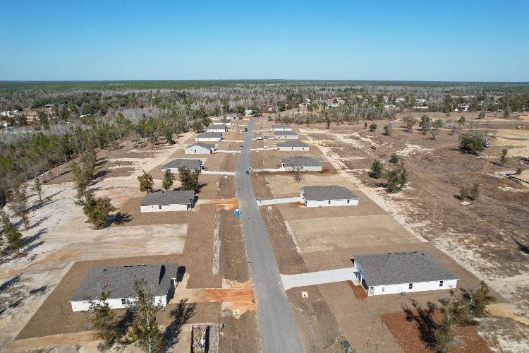 A large area with buildings and trees.