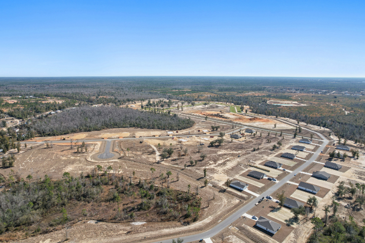 A large area with many cars parked in it.