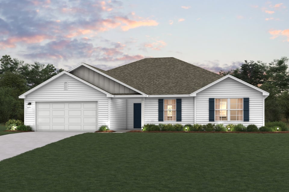 A house with a lawn in front of it.