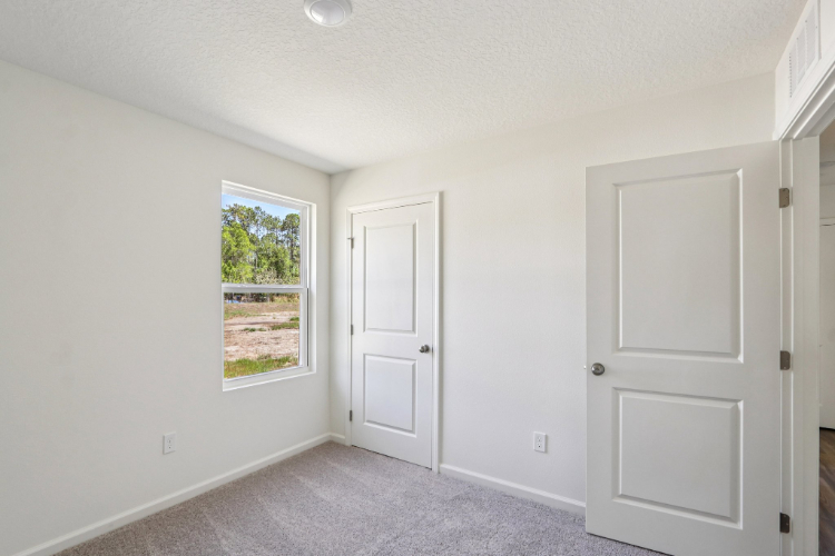 A room with white doors.