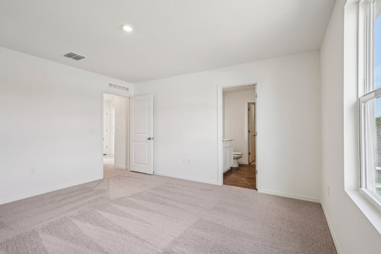 A hallway with white walls.
