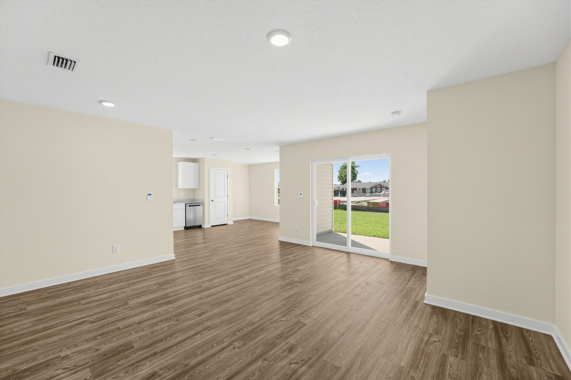 A room with a wood floor and a wood floor.