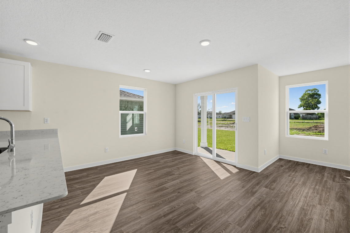 A room with a wood floor and a wood floor with a wood floor.